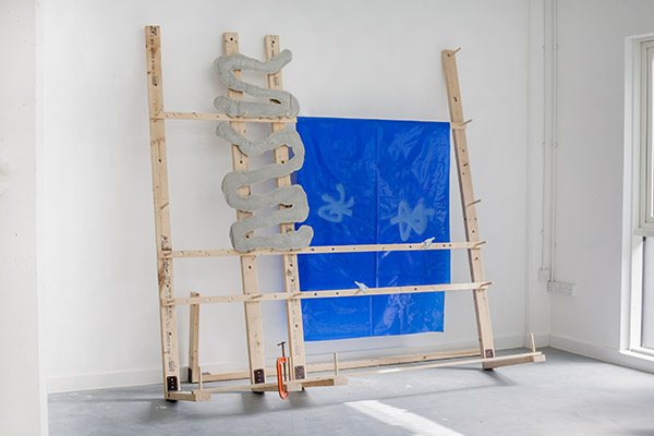 Glassrack Blue With Climbing Plant